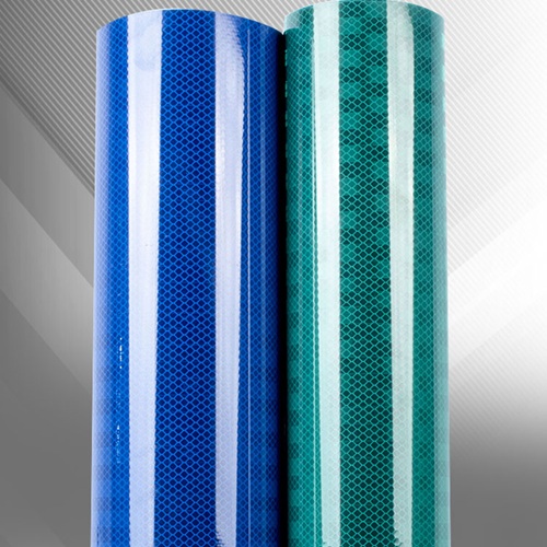 Pressure sensitive adhesive reflective vinyl